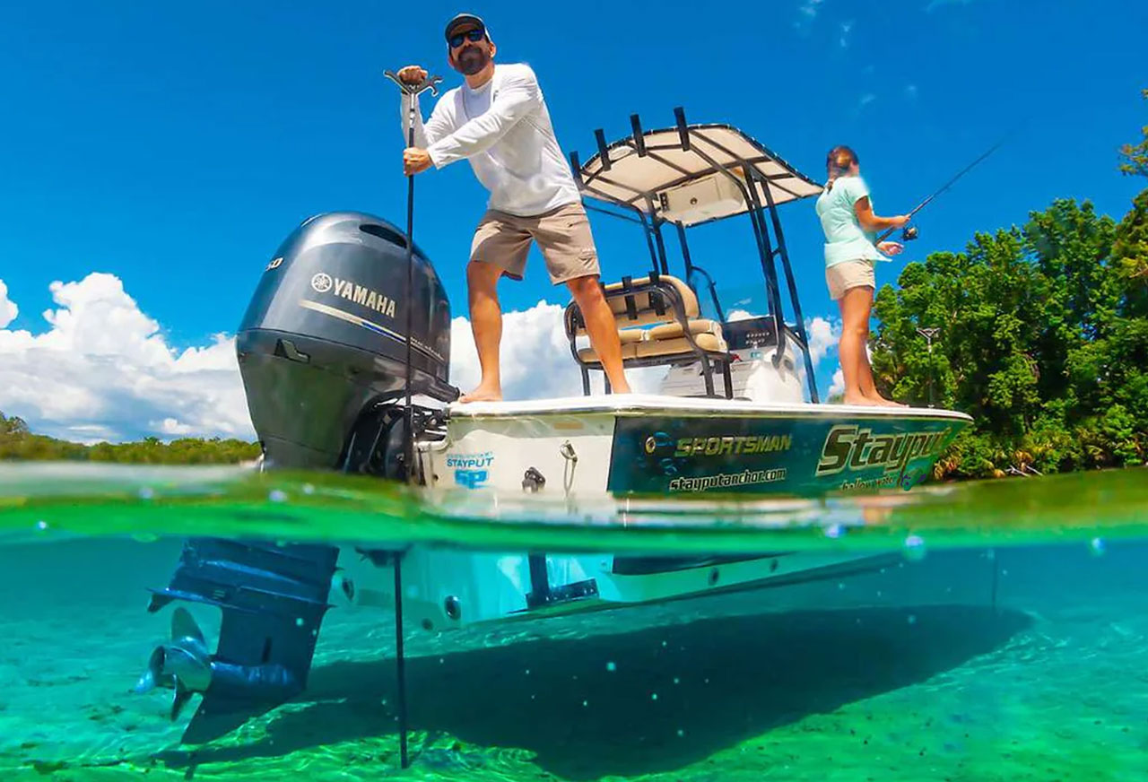 Photo of man using Stayput Anchor on boat